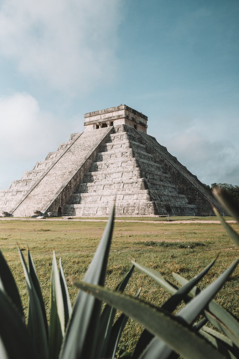 Explore the iconic El Castillo pyramid at Chichen Itza, a remarkable Mayan monument in Mexico.