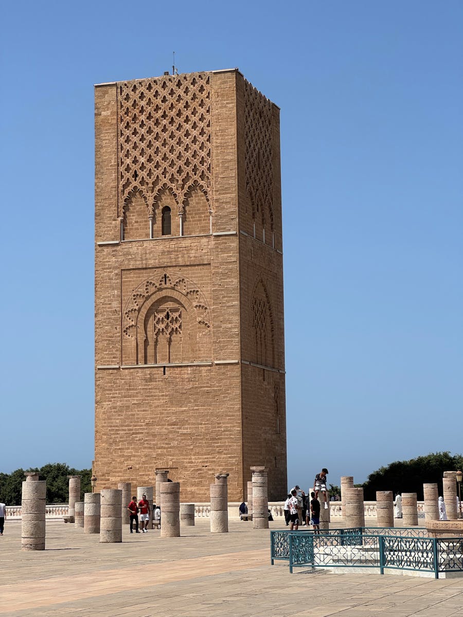 Beautiful view of Hassan Tower surrounded by pillars in Rabat, Morocco on a sunny day.